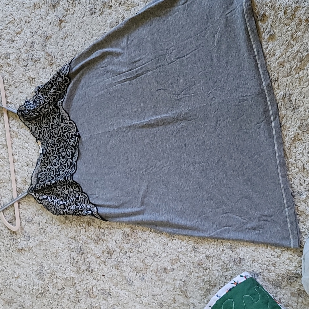 Gray cotton gown with black and silver lace detailing at top